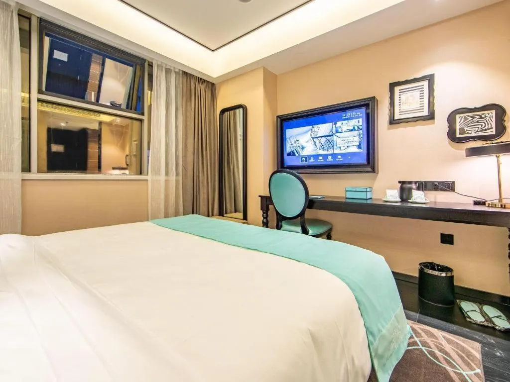 Bed in Xana Hotelle Tianjin Binjiang Road Heping Road Metro Station Quanyechang