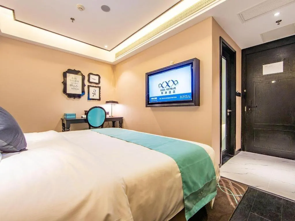 Bed in Xana Hotelle Tianjin Binjiang Road Heping Road Metro Station Quanyechang