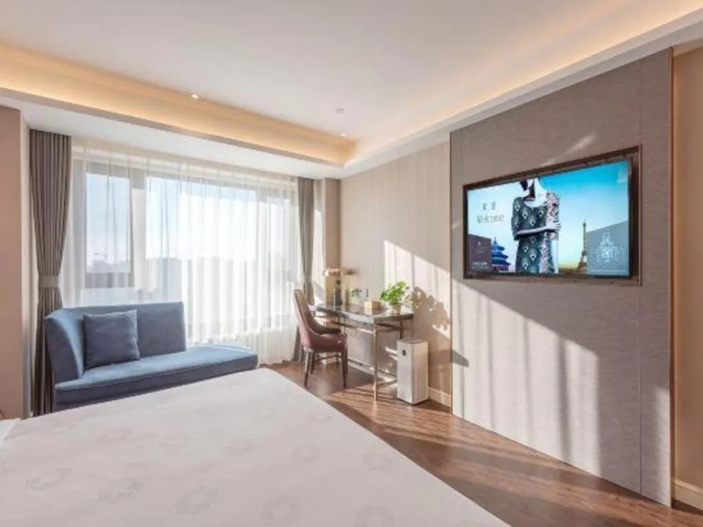 Bed in James Joyce Coffetel Harbin West High-speed Railway Station Wanda Plaza