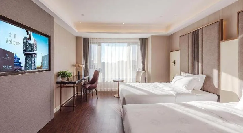 Bed in James Joyce Coffetel Harbin West High-speed Railway Station Wanda Plaza