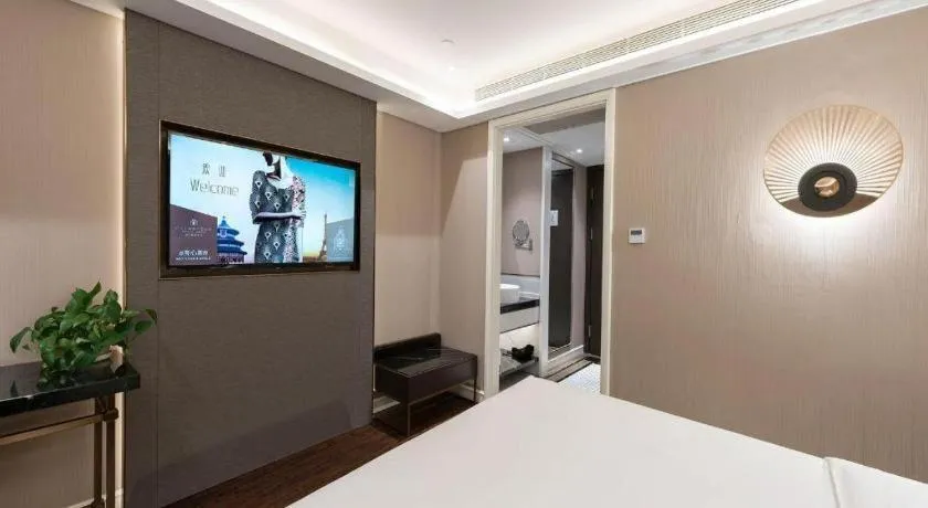 Bed in James Joyce Coffetel Harbin West High-speed Railway Station Wanda Plaza