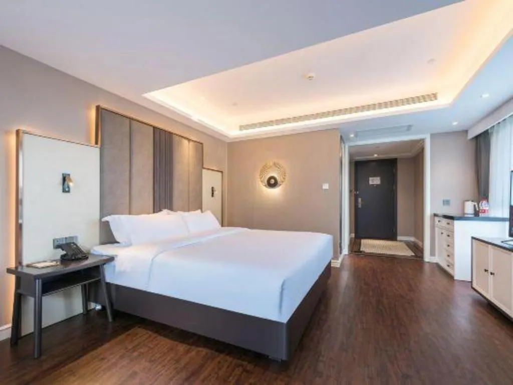 Bed in James Joyce Coffetel Harbin West High-speed Railway Station Wanda Plaza