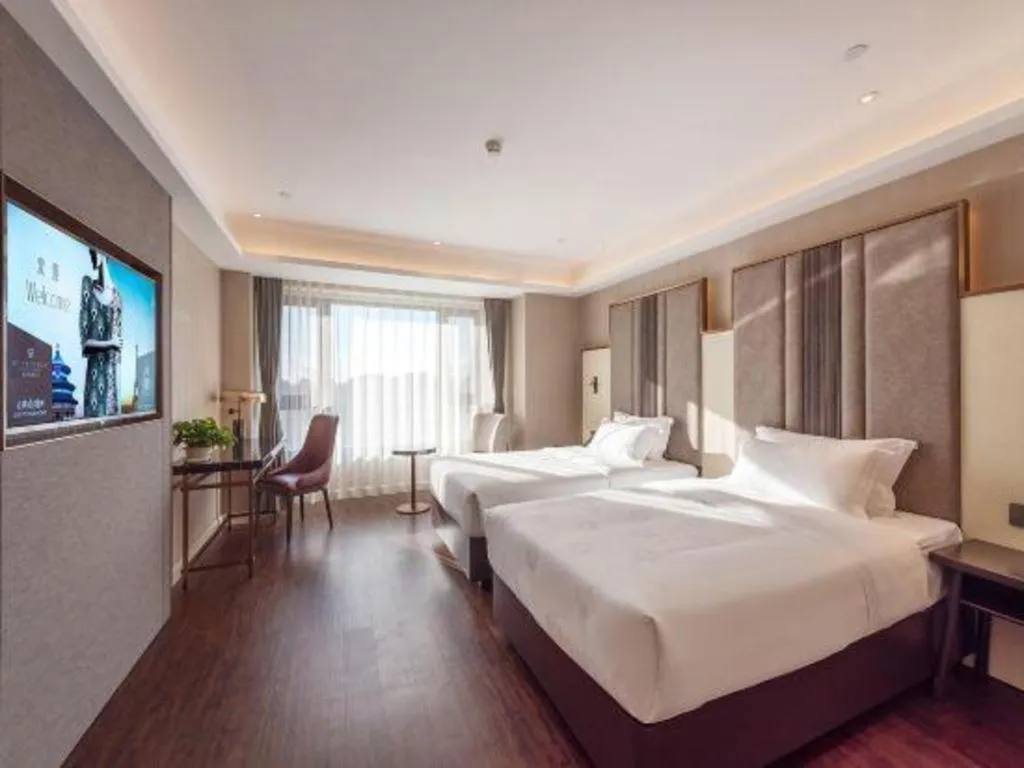 Bed in James Joyce Coffetel Harbin West High-speed Railway Station Wanda Plaza