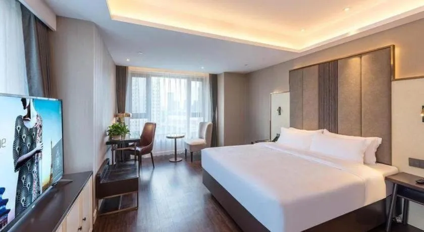 Bed in James Joyce Coffetel Harbin West High-speed Railway Station Wanda Plaza