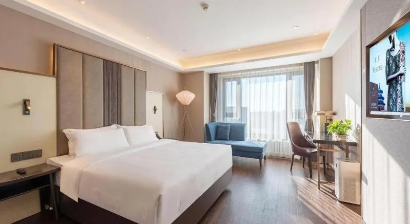 Bed in James Joyce Coffetel Harbin West High-speed Railway Station Wanda Plaza