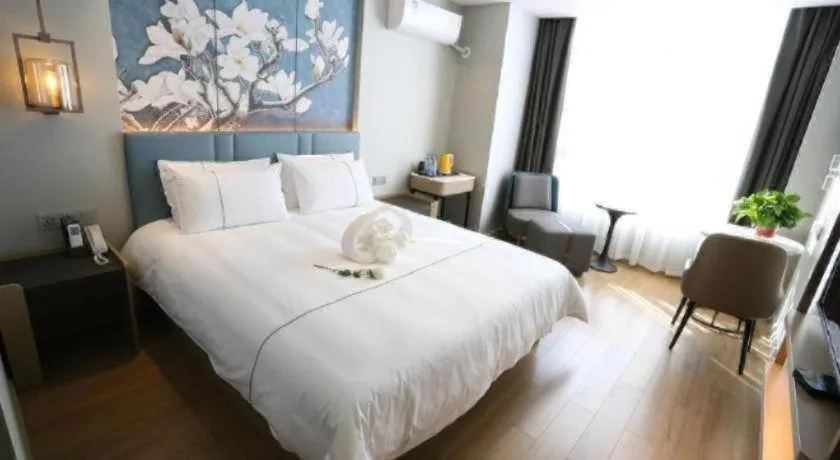 Bed in Magnotel Hengshui Lake Jizhou Middle School