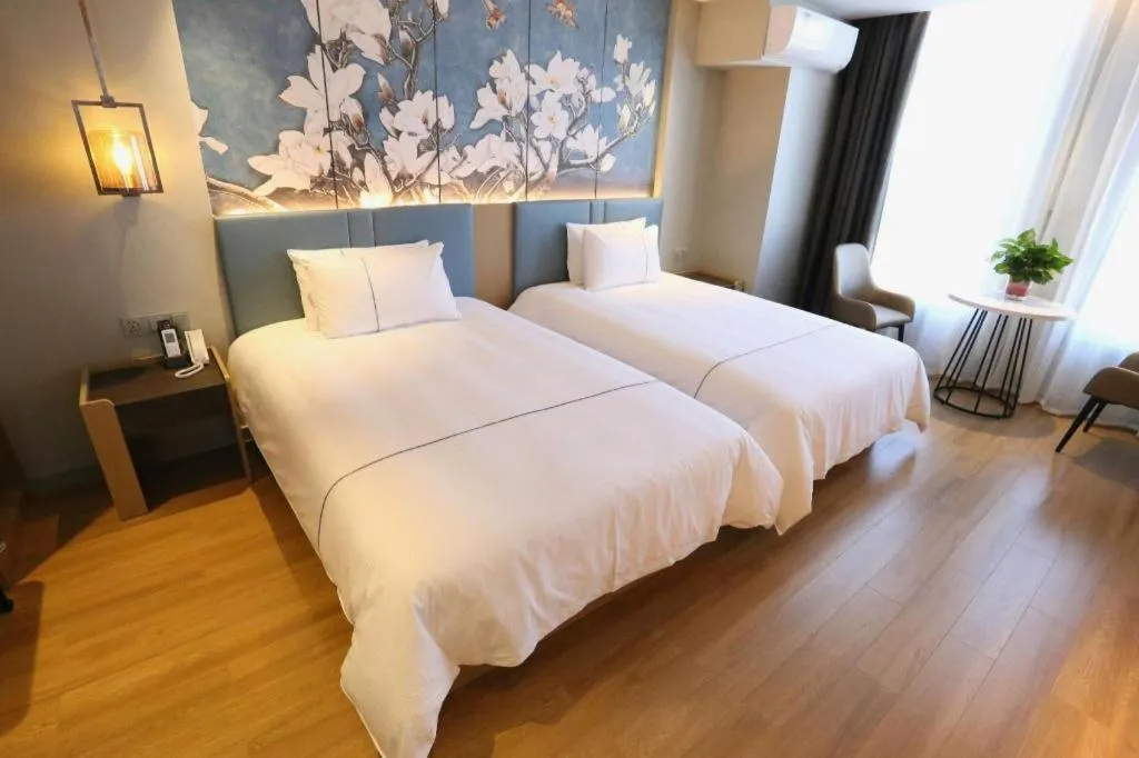 Bed in Magnotel Hengshui Lake Jizhou Middle School