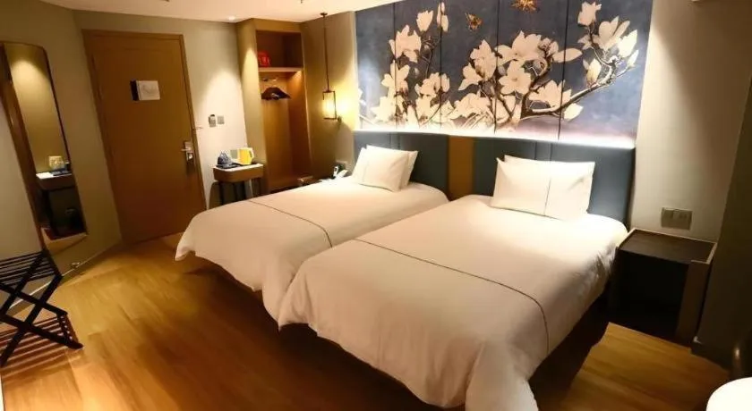 Bed in Magnotel Hengshui Lake Jizhou Middle School