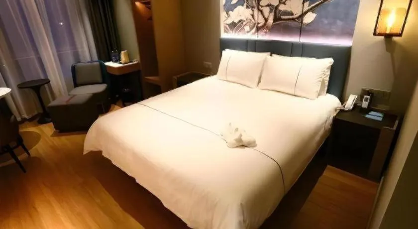 Bed in Magnotel Hengshui Lake Jizhou Middle School