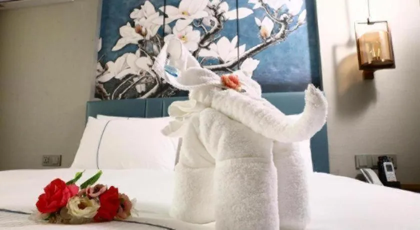 Bed in Magnotel Hengshui Lake Jizhou Middle School