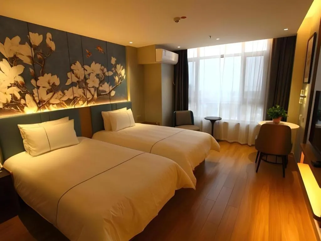 Bed in Magnotel Hengshui Lake Jizhou Middle School