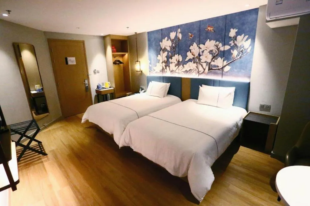 Bed in Magnotel Hengshui Lake Jizhou Middle School