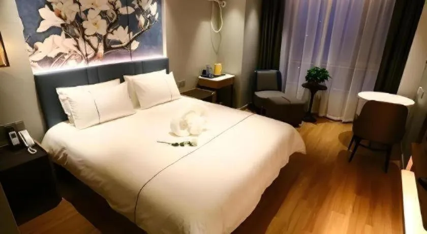 Bed in Magnotel Hengshui Lake Jizhou Middle School