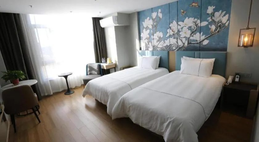 Bed in Magnotel Hengshui Lake Jizhou Middle School