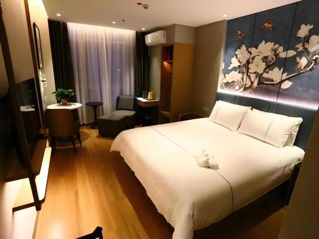 Bed in Magnotel Hengshui Lake Jizhou Middle School