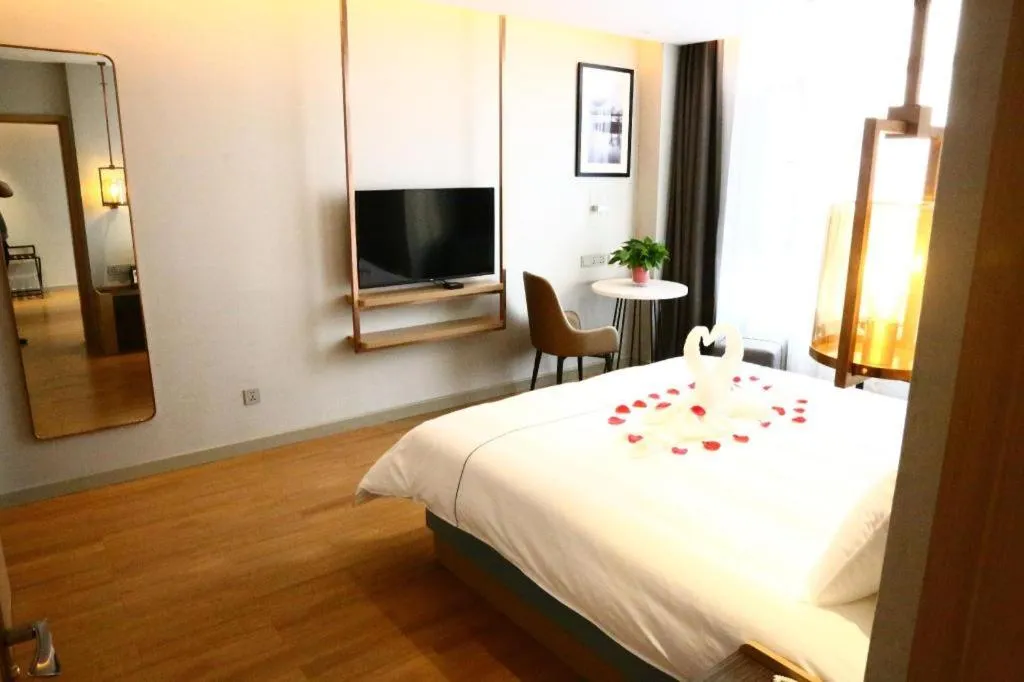 Bed in Magnotel Hengshui Lake Jizhou Middle School