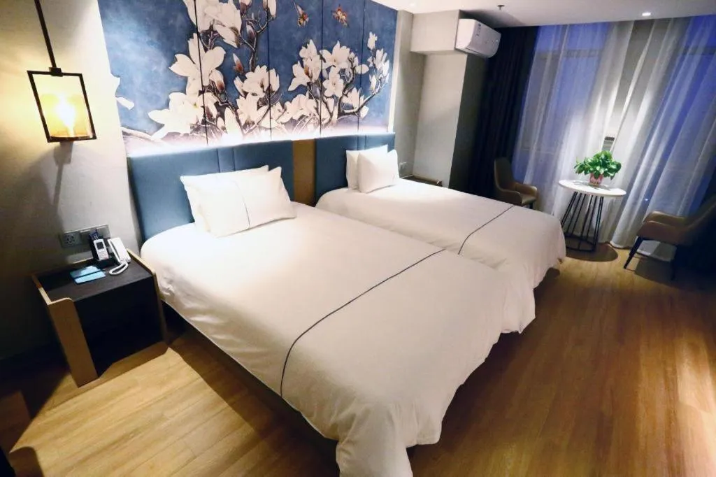 Bed in Magnotel Hengshui Lake Jizhou Middle School