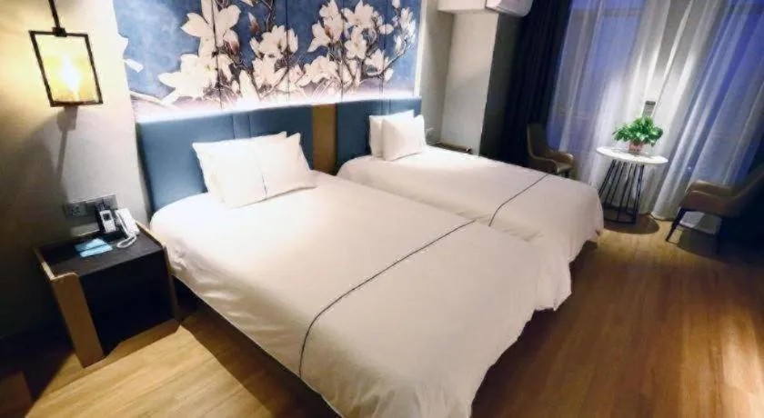 Bed in Magnotel Hengshui Lake Jizhou Middle School