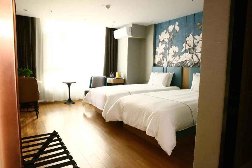 Bed in Magnotel Hengshui Lake Jizhou Middle School