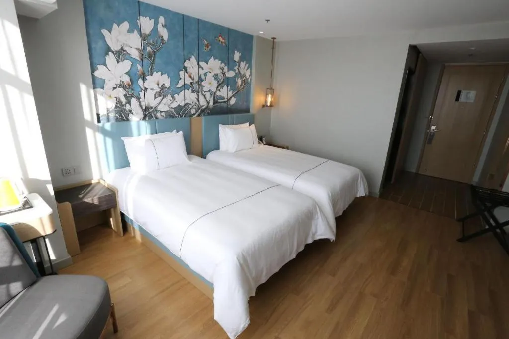 Bed in Magnotel Hengshui Lake Jizhou Middle School