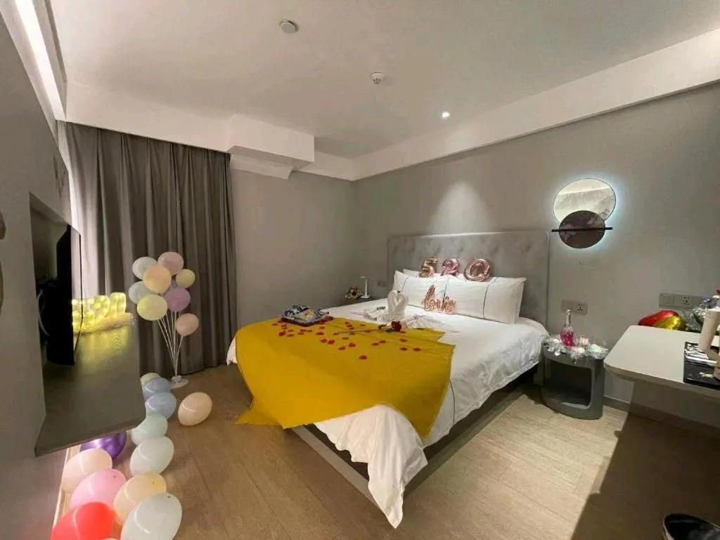 Bed in Magnotel Hotel Wuhan Jiangtan Lihuangpo Road Pedestrian Street