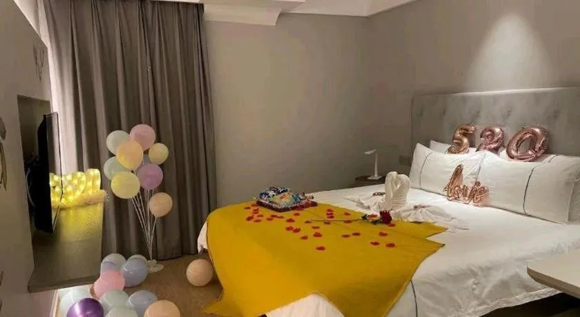 Bed in Magnotel Hotel Wuhan Jiangtan Lihuangpo Road Pedestrian Street