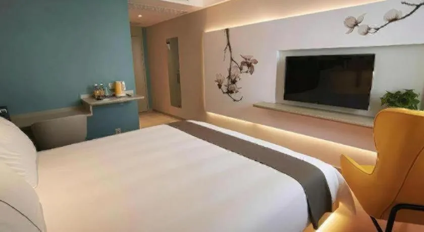 Bed in Magnotel Hotel Wuhan Jiangtan Lihuangpo Road Pedestrian Street