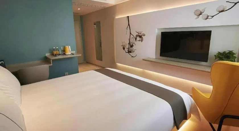 Bed in Magnotel Hotel Wuhan Jiangtan Lihuangpo Road Pedestrian Street