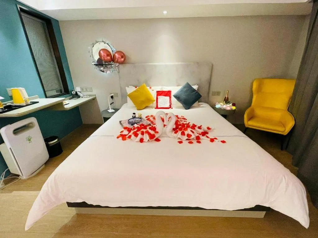 Bed in Magnotel Hotel Wuhan Jiangtan Lihuangpo Road Pedestrian Street