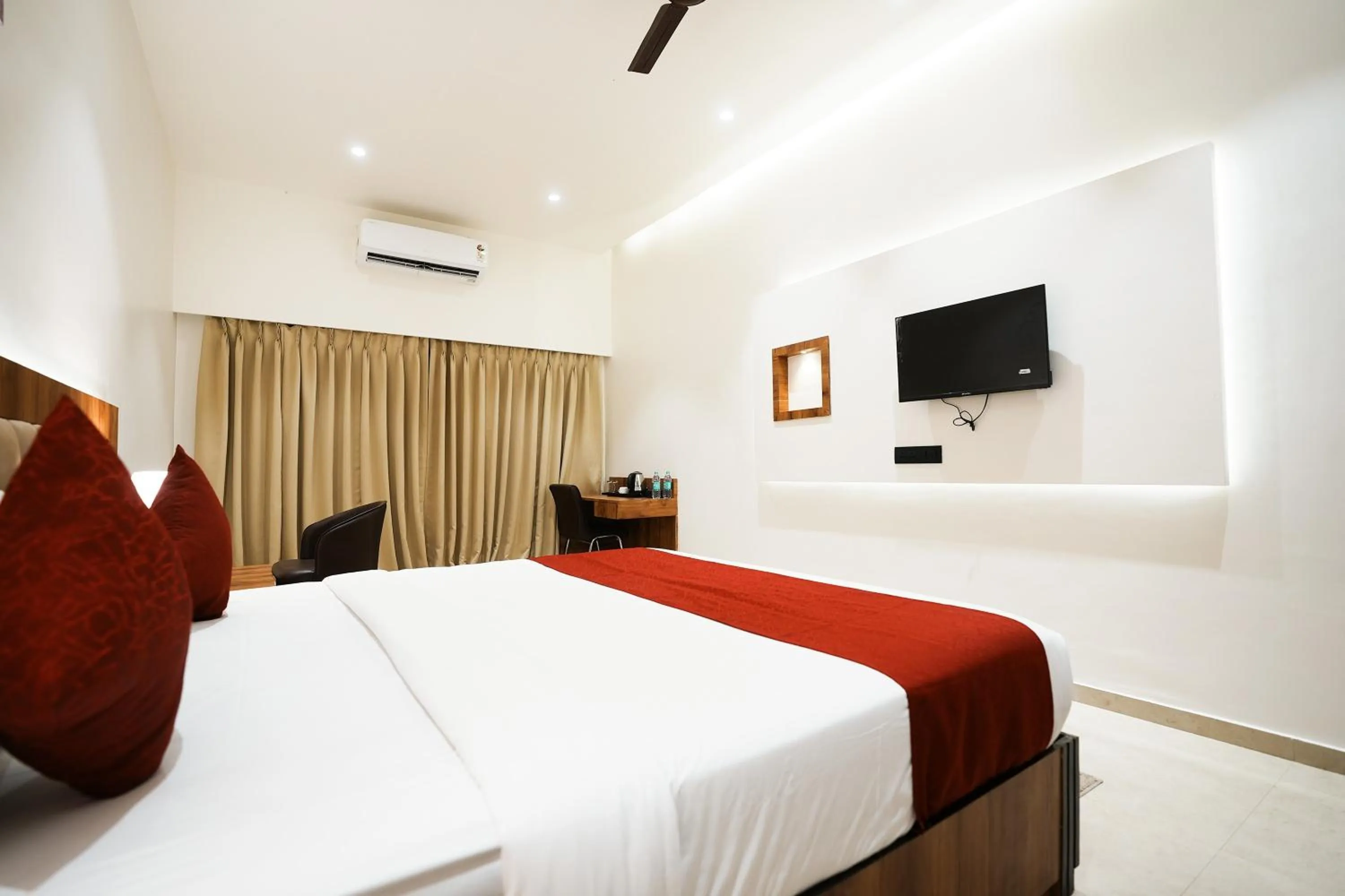 Bedroom, Bed in Madhav Residency Hotel & Banquet, Kalyan, Mumbai