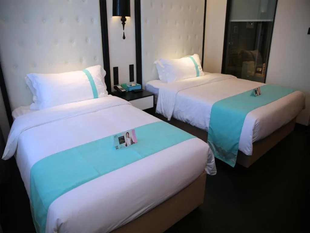 Bed in Xana Hotelle Nanchang Hongdu Middle Avenue Provincial TV Station