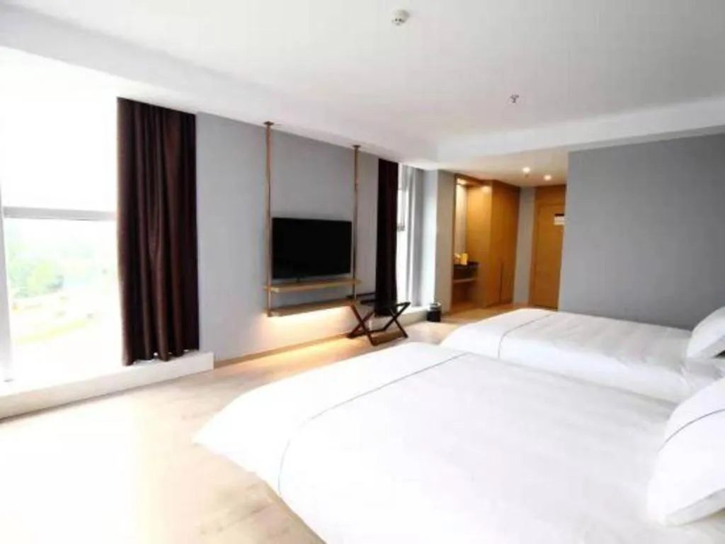 Bed in Magnotel Nanjing Lishui Baota Bei Road