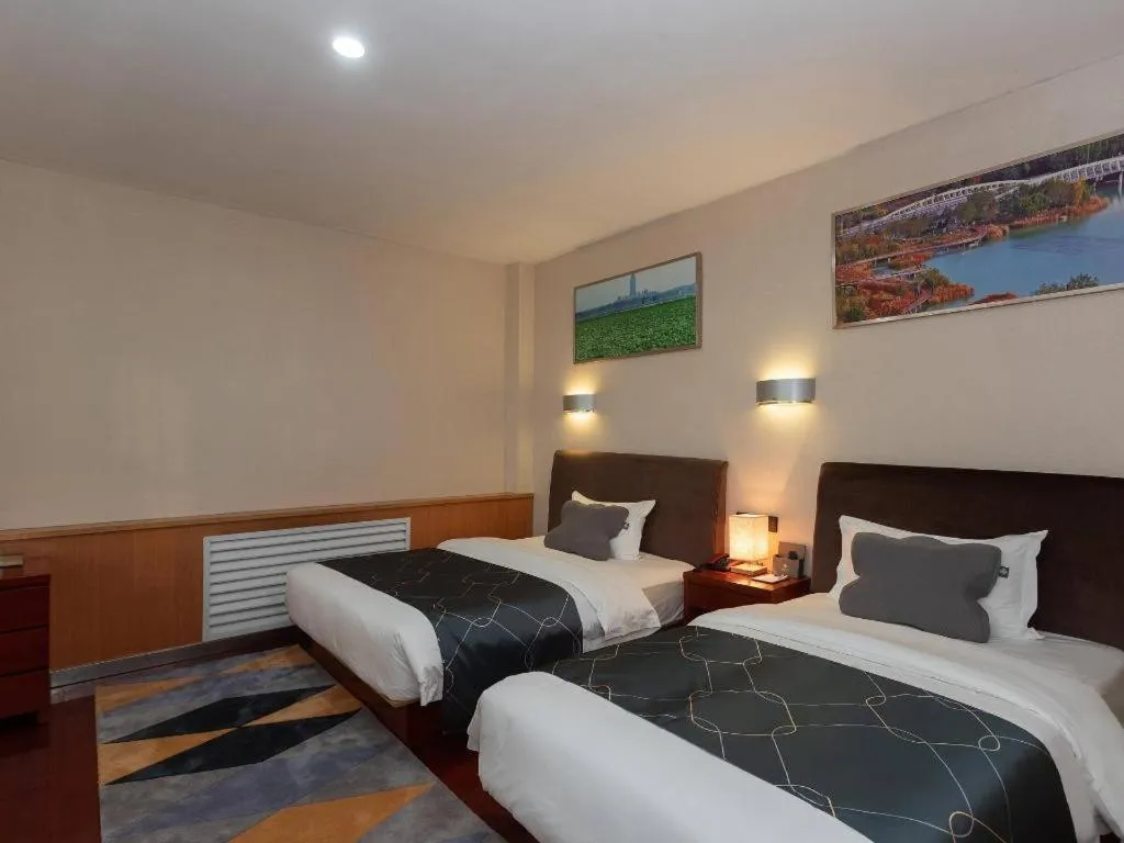 Bed in Chonpines Hotel Jining Quanmin Fitness Plaza