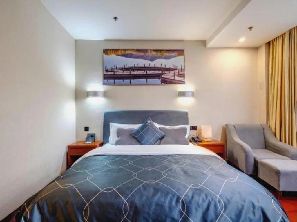 Bed in Chonpines Hotel Jining Quanmin Fitness Plaza