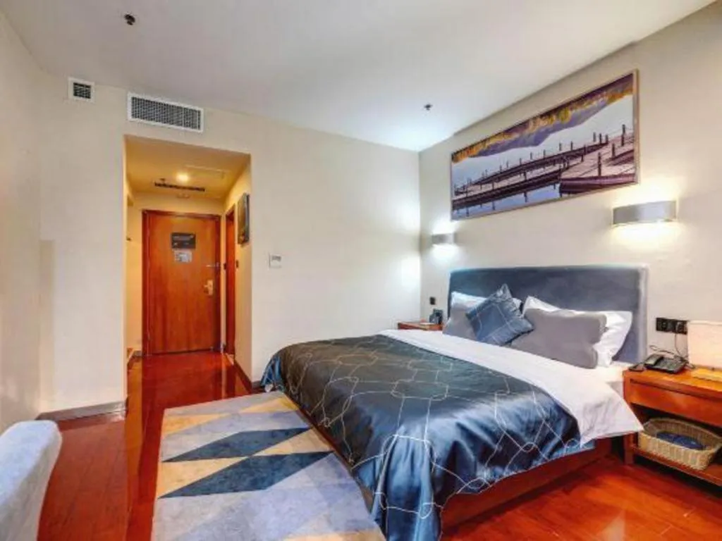 Bed in Chonpines Hotel Jining Quanmin Fitness Plaza