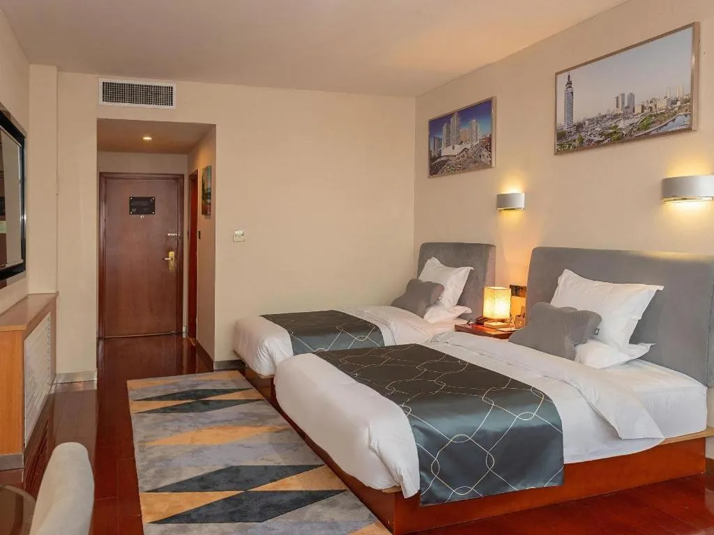 Bed in Chonpines Hotel Jining Quanmin Fitness Plaza