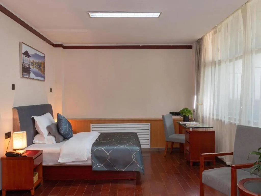 Bed in Chonpines Hotel Jining Quanmin Fitness Plaza