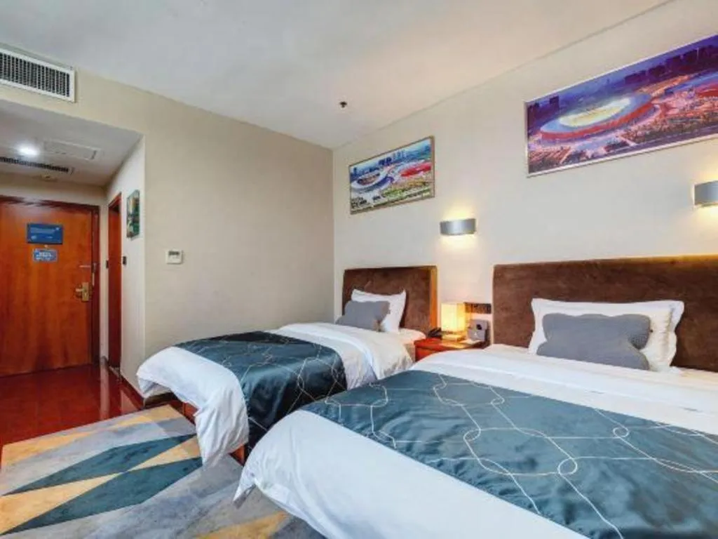 Bed in Chonpines Hotel Jining Quanmin Fitness Plaza