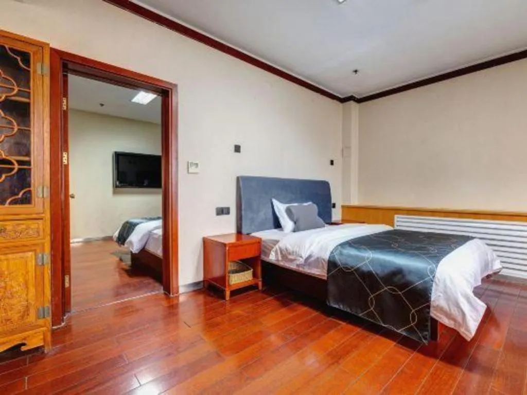 Bed in Chonpines Hotel Jining Quanmin Fitness Plaza