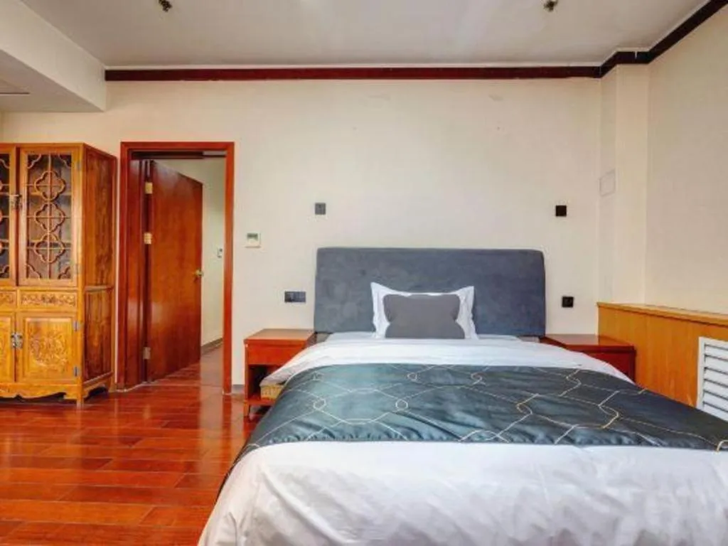 Bed in Chonpines Hotel Jining Quanmin Fitness Plaza