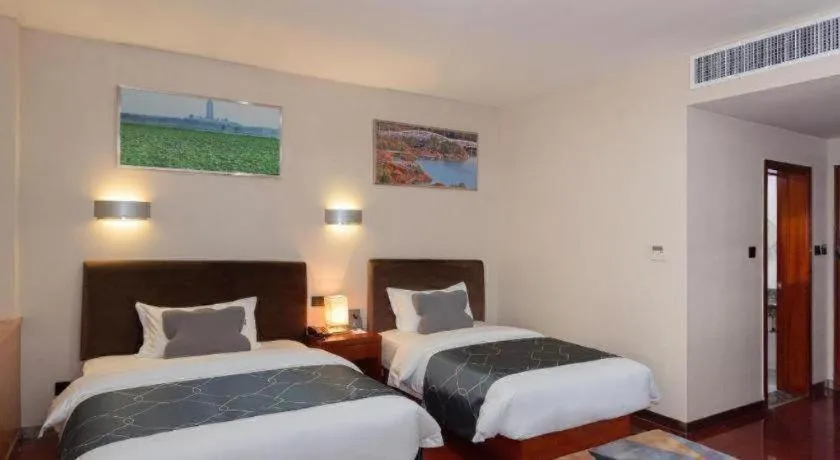 Bed in Chonpines Hotel Jining Quanmin Fitness Plaza