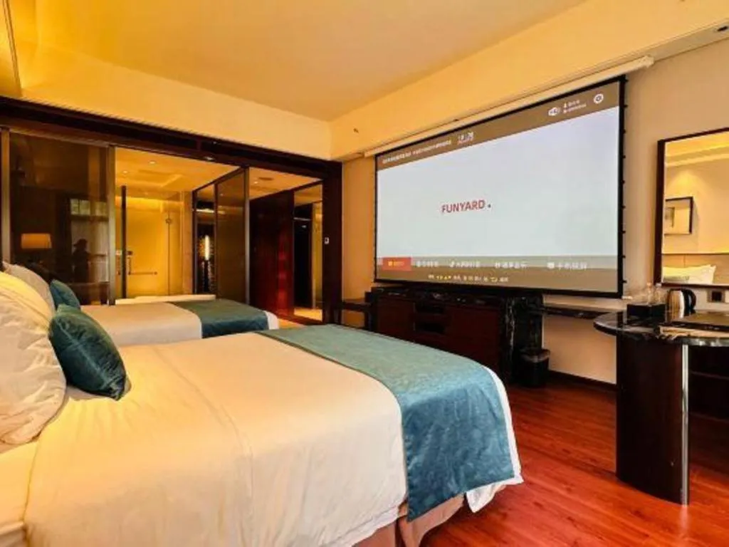 Bed in Country Garden Phoenix Hotel Yiyang