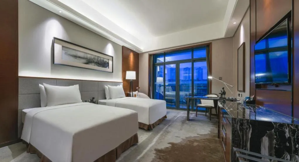 Bed in Country Garden Phoenix Hotel Yiyang