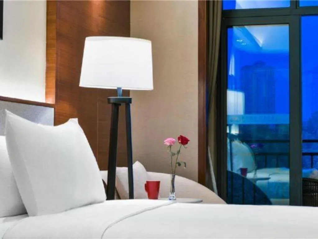 Bed in Country Garden Phoenix Hotel Yiyang