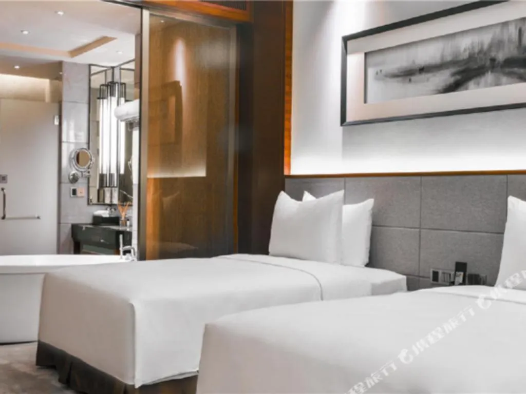 Bed in Country Garden Phoenix Hotel Yiyang