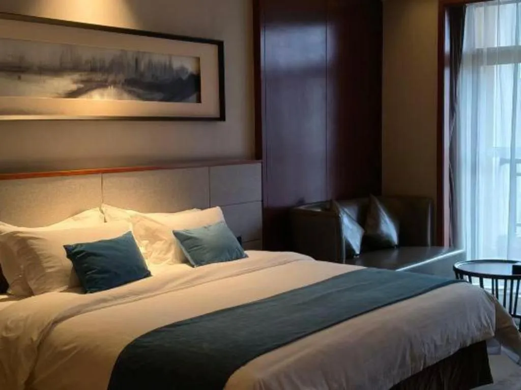 Bed in Country Garden Phoenix Hotel Yiyang