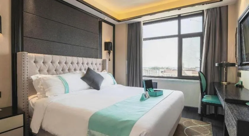 Bed in Xana Hotelle Tangshan North Railway Station