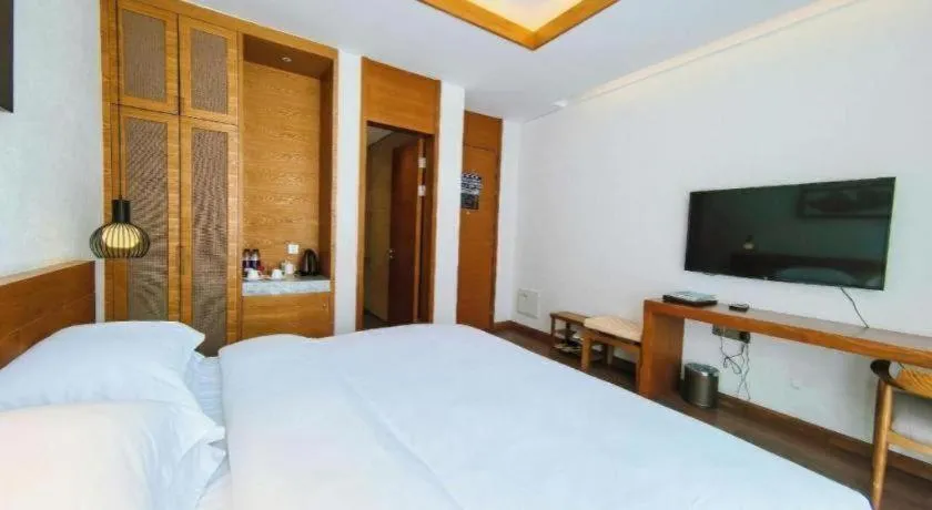 Bed in Ramada by Wyndham Guergou