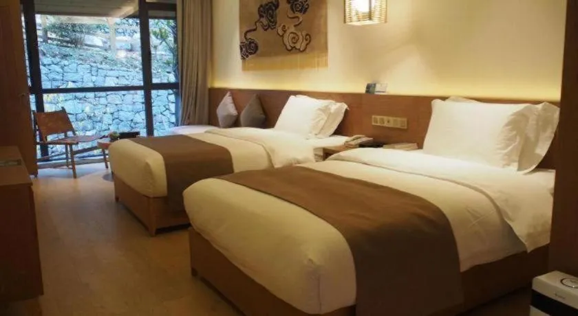 Bed in Ramada by Wyndham Guergou