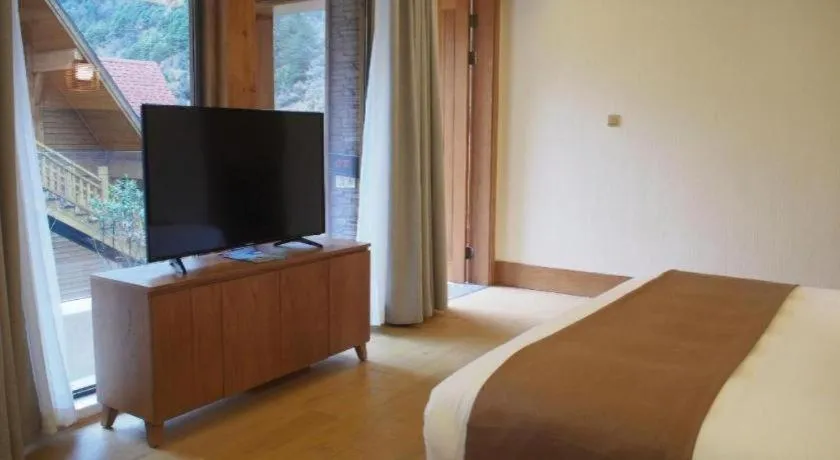 Bed in Ramada by Wyndham Guergou